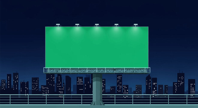 Large blank green screen billboard with top spotlights at night, positioned above a city skyline with lit windows and a dark blue night sky backdrop, ideal for digital mockups.