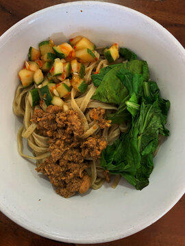 Bowl of Noodles With Toppings