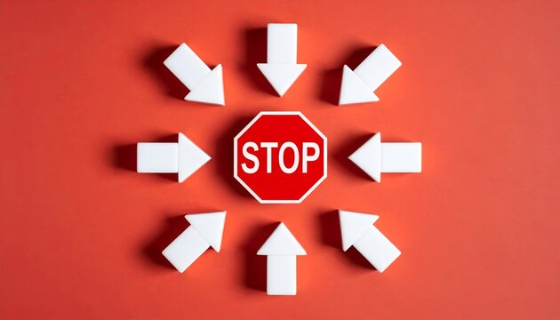 Red stop sign center surrounded by white arrows. Arrows point outward in all directions