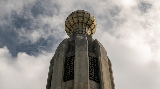 Thomas Edison Memorial Tower Light Bulb Sculpture Against Dramatic Sky, Edison New Jersey