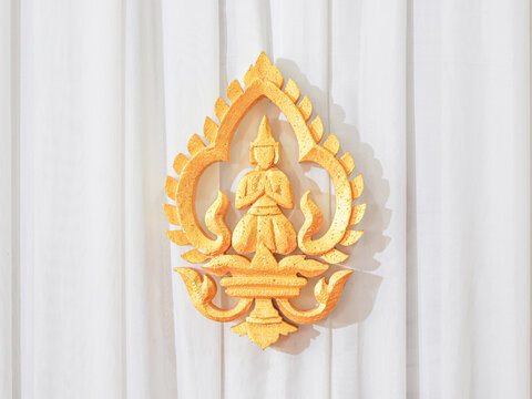 golden statue decoration on curtain for festival khmer art