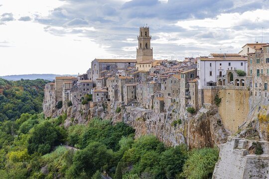 Panoramic view of the medieval town of Pitigliano, dark clouds above, Pitigliano, Tuscany, Italy