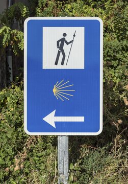 Camino de Santiago road sign with shell symbol, Puente La Reina, Navarre, Spain