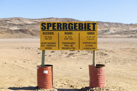 Warning sign at the diamond exclusion zone in the Sperrgebiet National Park, also Tsau ǁKhaeb National Park, Namibia