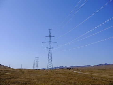 Power line through the Mongolian steppe, T&ouml;w Aimag, T&ouml;w Province, Mongolia