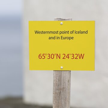 Shield, westernmost point of Iceland and Europe, with coordinates, Cape Bjargtangar, L&aacute;trabjarg, Vestfir&eth;ir Peninsula, Westfjords, Iceland