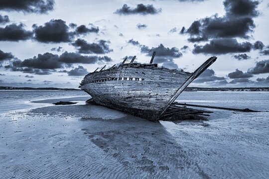 Wooden Shipwreck Bad Eddies Boat at Low Tide, Evening Sky, Bunbeg, Magheraclogher Beach, Gweedore, Donegal, Ireland