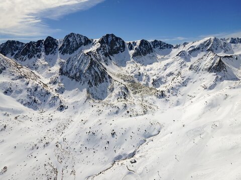 Majestic snow-capped mountain peaks under a clear blue sky, landscape near El Pas de la Casa, Encamp, Andorra, Pyrenees