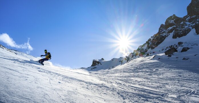 Snowboarder with splitboard rides in the snow, ski tour Geierspitze, Wattentaler Lizum, Tuxer Alps, Tyrol, Austria