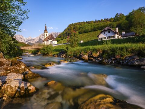 Parish church of St Sebastian on the Ramsauer Ache in the morning, Reiteralpe at the back, Ramsau, Berchtesgadener Land, Upper Bavaria, Bavaria, Germany