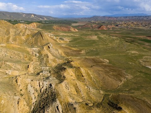 Expansive landscape with brown and green tones, gently rolling hills and open sky, aerial view, mountains on D70 and D80, Tuzluca, Igdir Province, Iğdır, Eastern Anatolia, Anatolia, Turkey