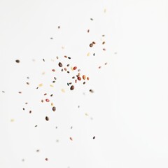 Obraz premium tiny fruit seeds floating in airy composition, soft lighting, minimal aesthetic, white background, copy space