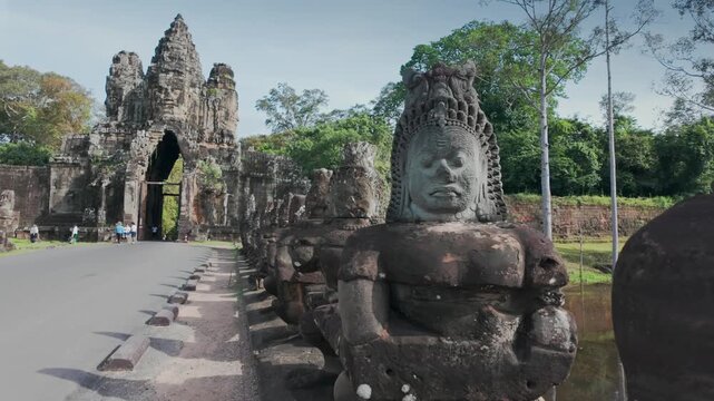 Ancient stone carving of a female deity at Angkor Wat, Siem Reap, Cambodia. The intricate details showcase the artistry of Khmer architecture.