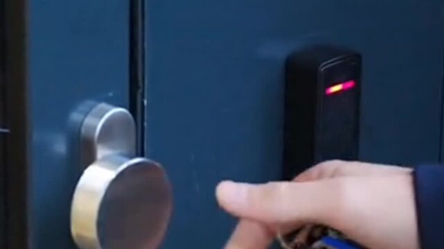 
open the door with an electronic keychain