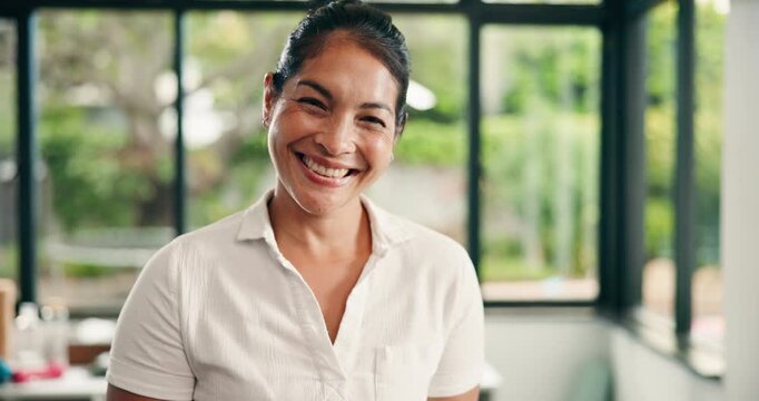 Physiotherapist, face or Asian woman in clinic with smile, about us and experience in rehabilitation services. Happy, portrait and chiropractor with confidence, career or pride in healthcare industry