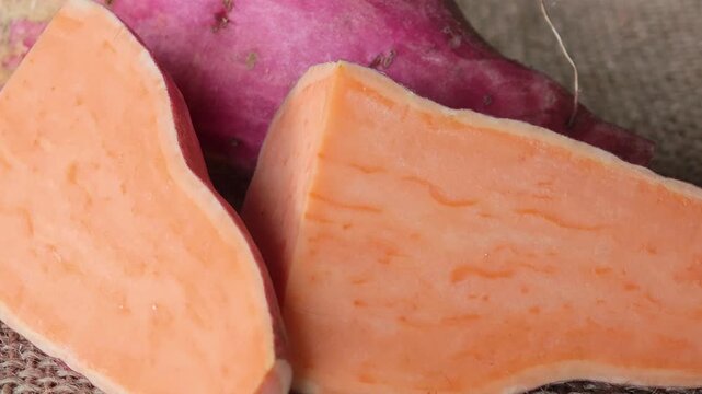 Orange sweet potatoes on a plate.