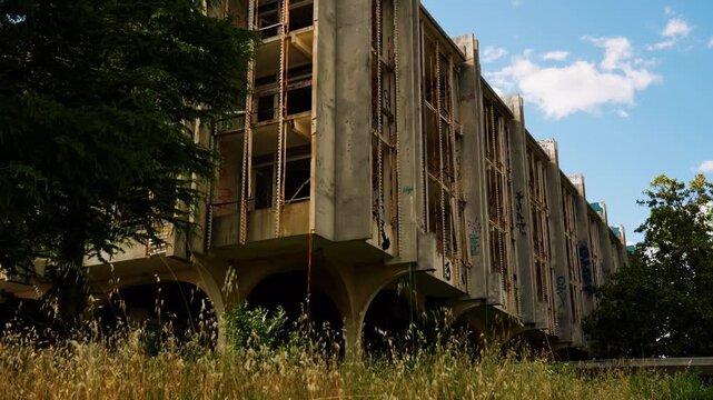 Exterior view of the abandoned Haludovo Palace Hotel in Malinska on Krk Island, Croatia. Former luxury resort from ex Yugoslavia now left decaying, covered in graffiti and urban decay.
