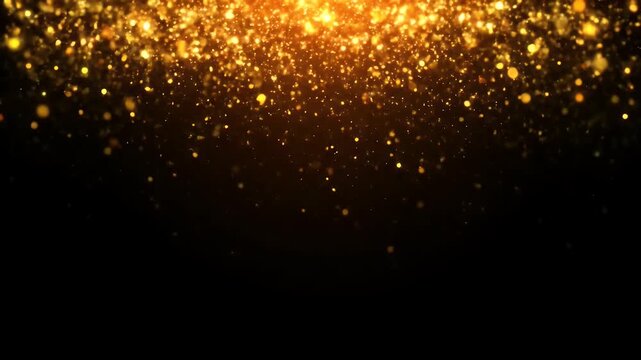 golden glitter particles falling from the top on a black background for celebrations