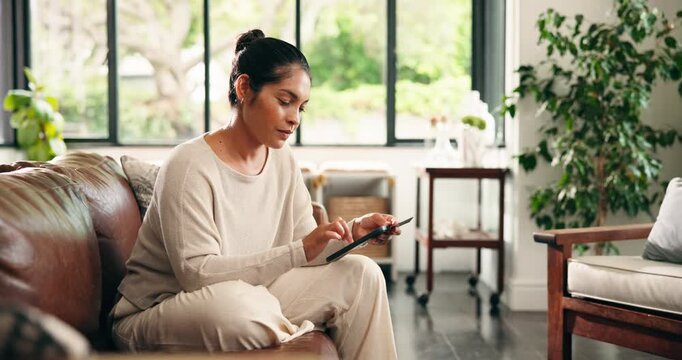 Woman, tablet and relax on sofa with smile in home with streaming, scroll and search for video in lounge. Person, tech and happy on application, typing or subscription for film on couch at house