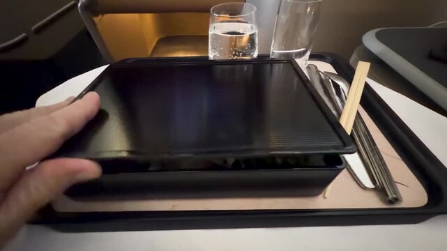 Opening a Luxury Japanese Bento Box Meal in Airplane Business Class