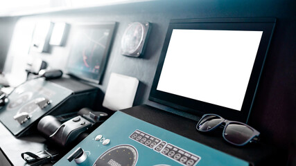 Blank monitor screen of GPS navigation and marine radar system with VHF Radio, binoculars and sunglasses on boat dashboard in wheelhouse or ship captain bridge. Nautical vessel transport technology © zephyr_p