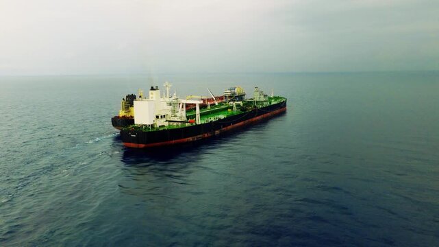 Drone footage of Iranian ship to ship oil tankers transferring oil evading sanctions