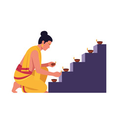 Fototapeta premium Man lighting oil lamps at a hindu temple vector