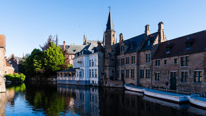 Fototapeta premium Tower Scenery on Bruges Canal