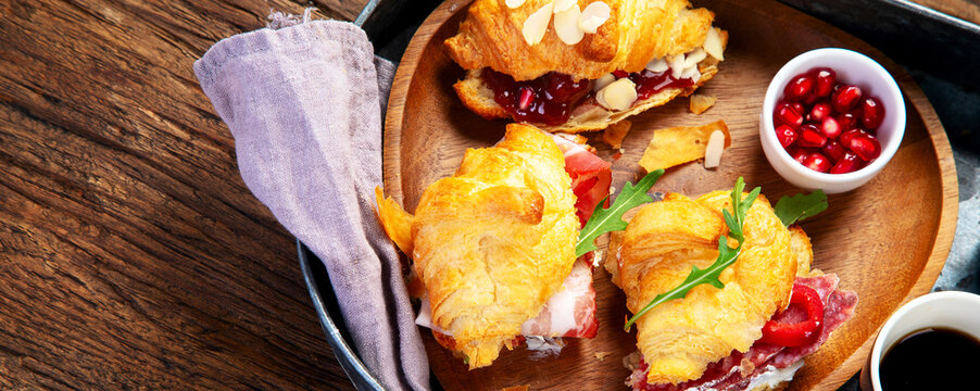 Breakfast served with coffee and croissants. Balanced diet.