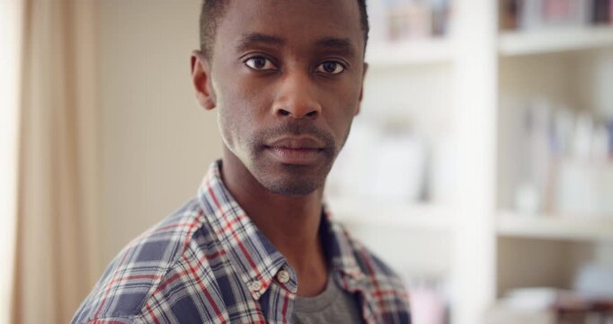 Serious, face or home with black man or confidence for shelter, safety or protection. Portrait, male person or pride with comfort or bachelor for morning break, security or self awareness in house