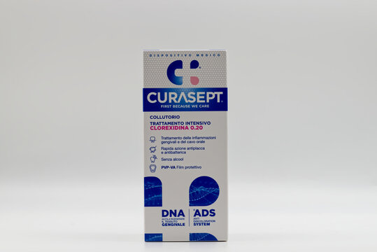 Bologna - Italy - May 2026: Box of curasept intensive mouthwash treatment with chlorhexidine zero point two percent isolated on white background.