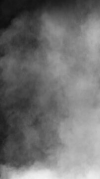 Vertical video of dense white fog or smoke effect, perfect for creating atmosphere in social media content