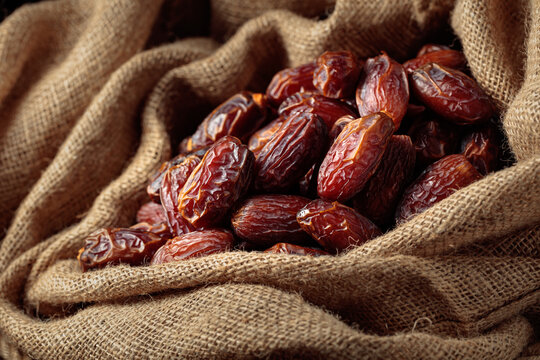 Dates in burlap bag.
