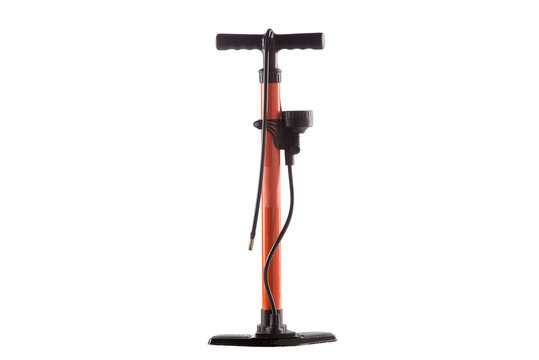Red pump stands upright on white surface
