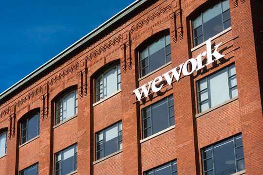 Toronto, Canada - April 17, 2026: Vivid urban scene highlighting professional branding contrast on aged masonry surface