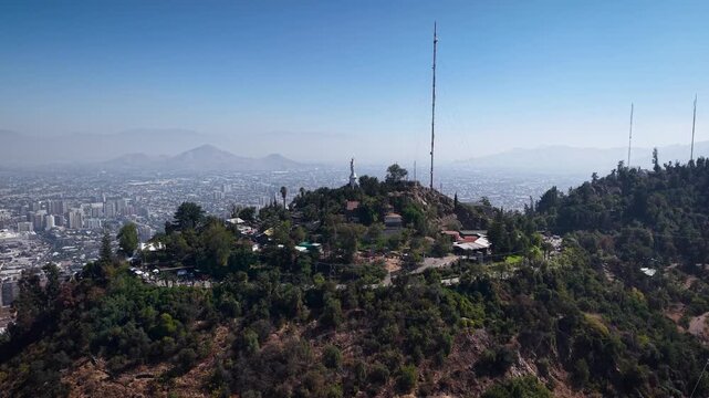 4K aerial drone footage of cerro San Cristobal peak in Santiago de Chile
