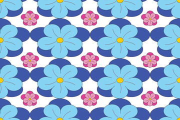 Naklejka premium Cute seamless floral pattern with large blue flowers and small pink blossoms in retro cartoon style. Colorful repeating background design for fabric, wallpaper, wrapping paper, textile, scrapbook, and