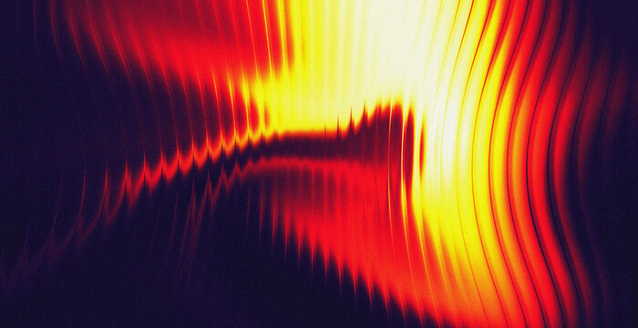 Abstract dark background with glowing red and yellow fire wave distortion and jagged sound wave streak for dramatic energy and music design