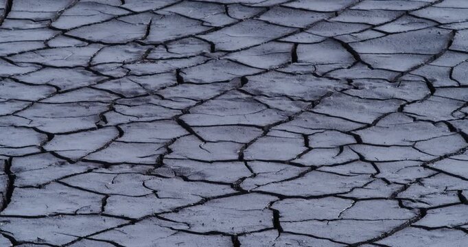 This powerful video captures the stark reality of dry, cracked land. The fissures in the earth tell a story of survival, endurance, and the pressing challenges posed by changing climates.