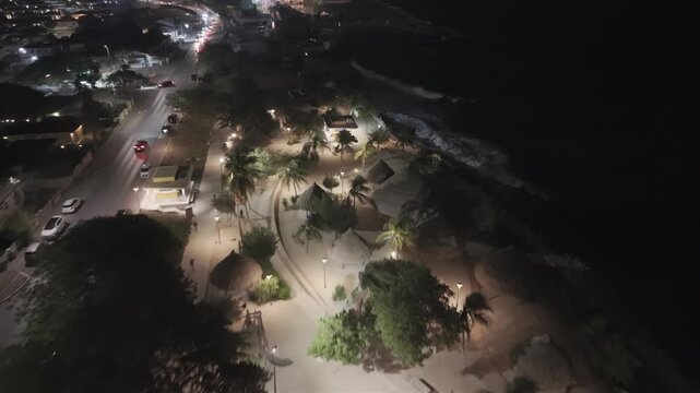 Night drone footage in slow motion flying over the Mari Pampoen area location Curacao.