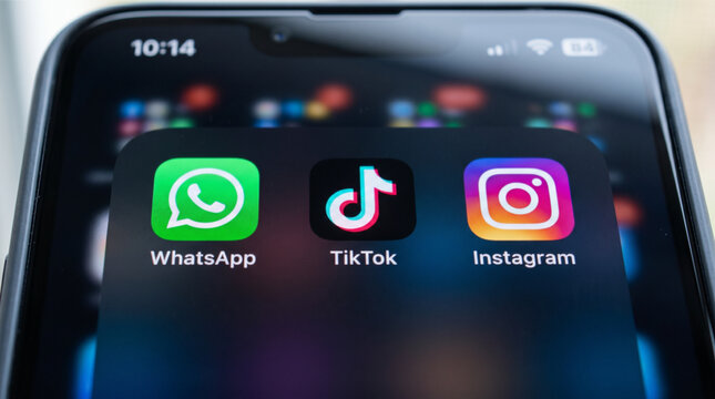 WhatsApp, TikTok, and Instagram mobile icons app on a screen smartphone iPhone. WhatsApp, TikTok, and Instagram are leading social media and communication platforms for global users today.