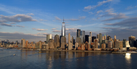 Obraz premium NYC Manhattan cityscape with New York panorama with blue sky. New York downtown cityscape with blue sky panorama. New York City skyline. Manhattan skyline in New York City.