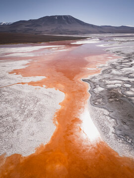 High aerial view of a colorful mineral salt lake