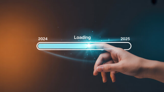 Hand interacting with loading bar from 2024 to 2025 on dark background with orange glow