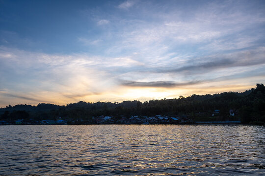 Fishermen village at sunset on Waleakodi Island, Togian archipelago, Indonesia