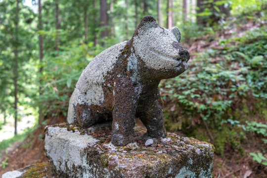 Bear statue in Hida Minzoku Mura Folk Village forest, Takayama