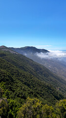 Obraz premium West coastline view with mountains range and clouds, Island El Hierro, Canary Islands, Spain, Europe.