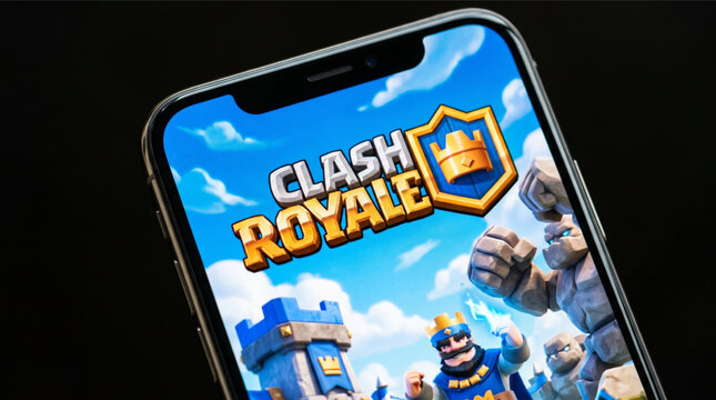 Clash Royale mobile logo app on a screen smartphone iPhone. Clash Royale is a free-to-play real-time strategy video game developed and published by Supercell for iOS and Android mobile platforms.