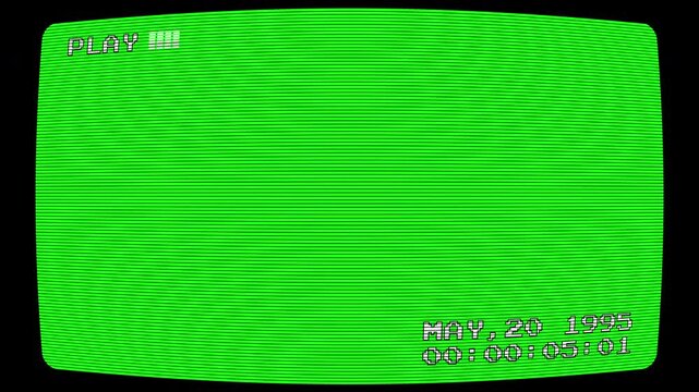 A vintage television screen displays a green static image with date and time
