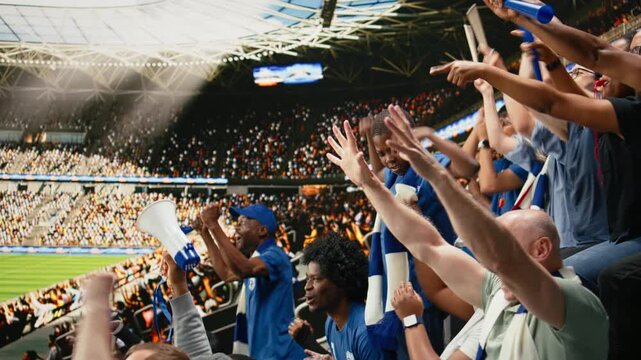 Young soccer fan standing among cheering supporters during live football match, capturing excitement of childhood and sports family, black father acting as role model during fun football match.